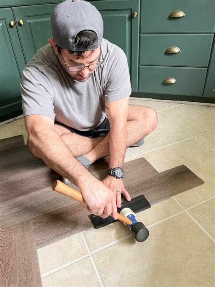 Can you install vinyl tile over linoleum