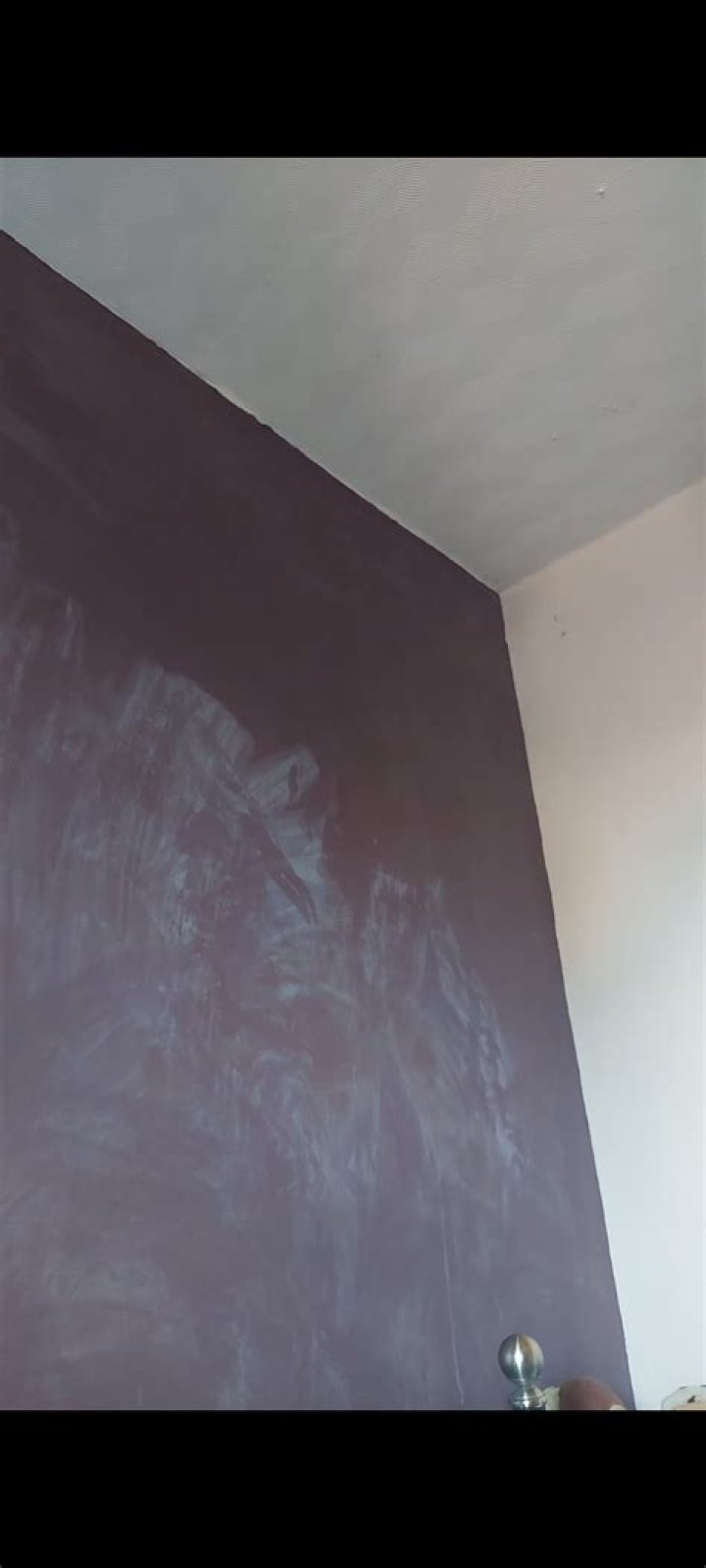 Why do my painted walls feel sticky